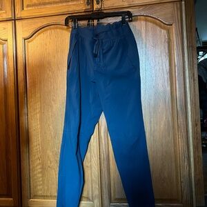 Ten thousand men’s blue track pants